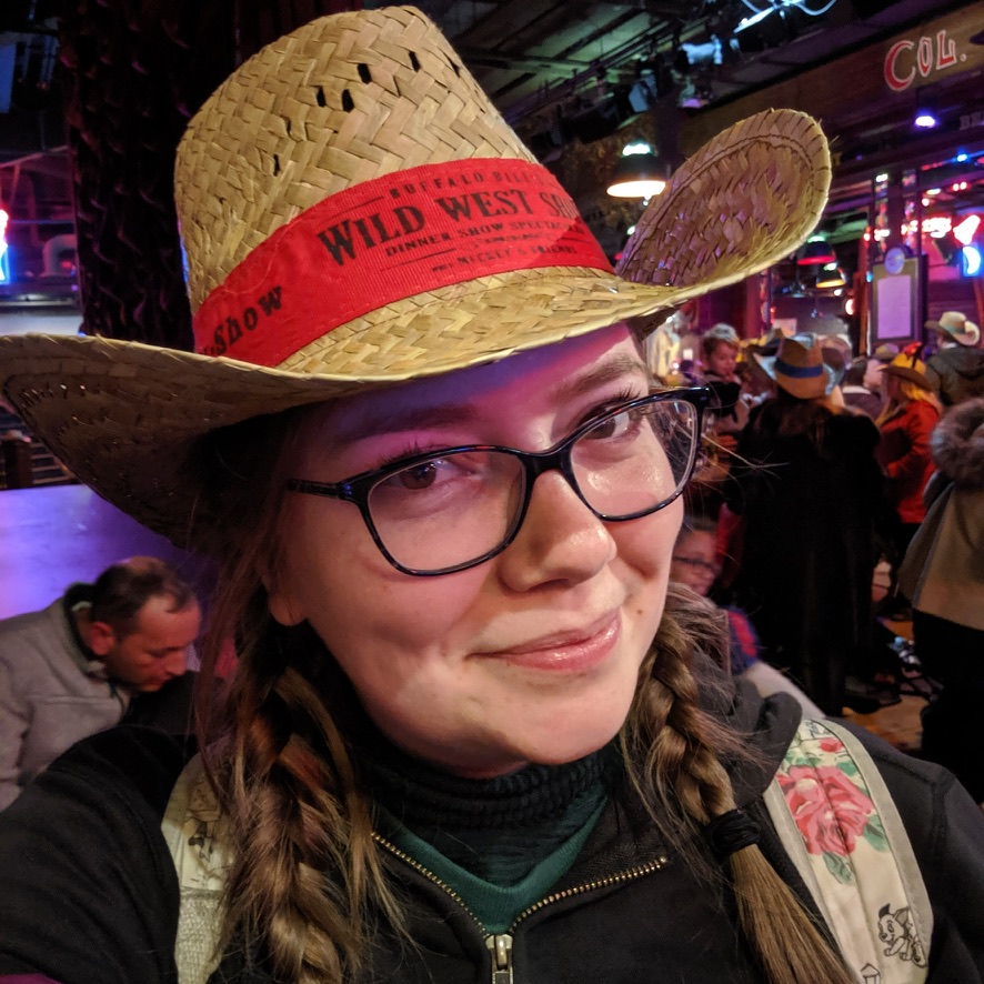 A picture of Amy Walker wearing a Disneyland cowboy hat